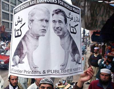 From Muslim demonstration against the Mohammed caricatures depicting Bush and Fogh as dogs